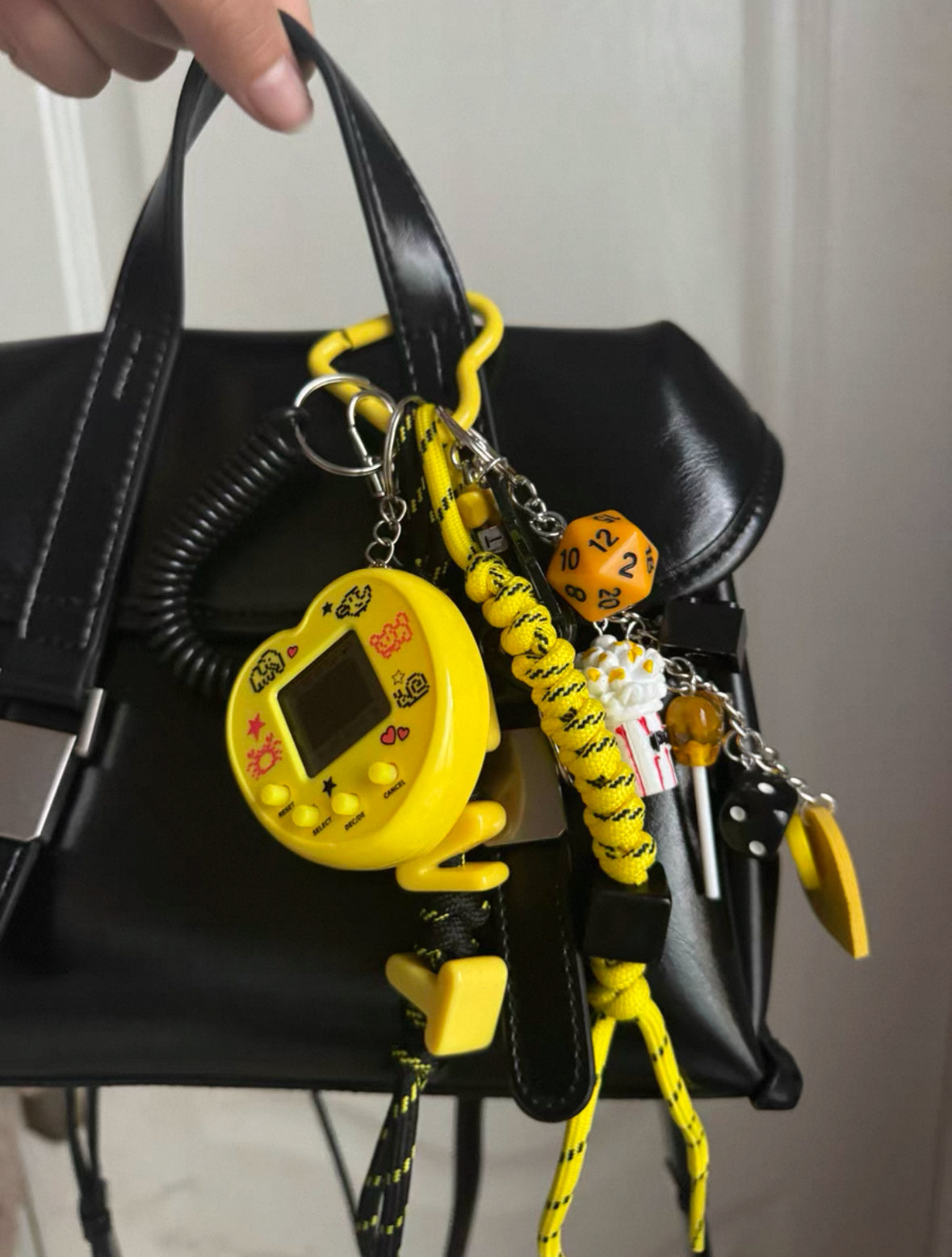 Blk & yllw bag keychain